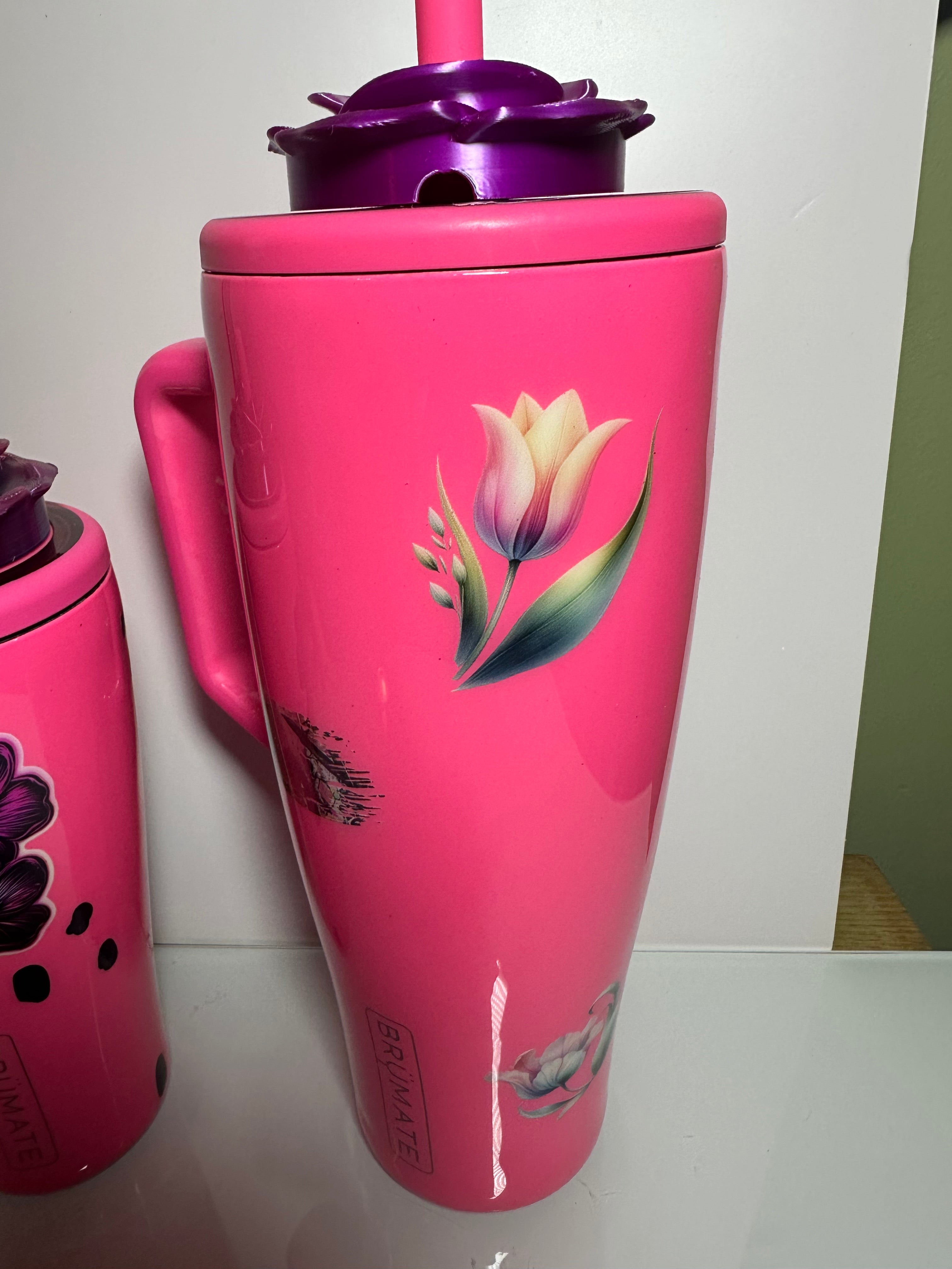 40 oz Brumate Era Pink tumbler with flower decor and a rose Tumbler Topper